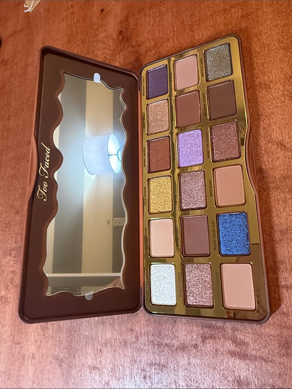 Too Faced Eyeshadow Palette with Gold, Brown, Purple and Blue Shades